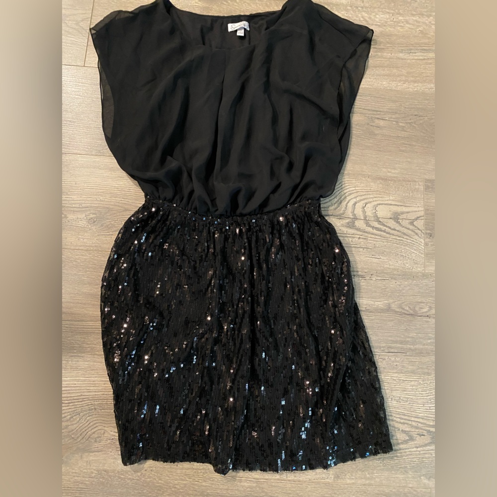 Black dress with sequin skirt
